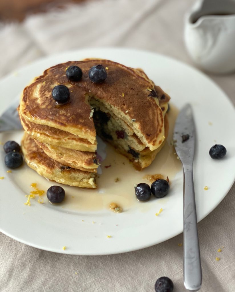 Lemon and Blueberry Ricotta Pancakes with a section cut out Pure Maple