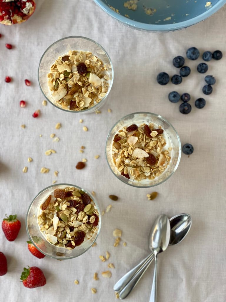 Overnight oats with chia seeds, topped with yoghurt and granola Pure Maple