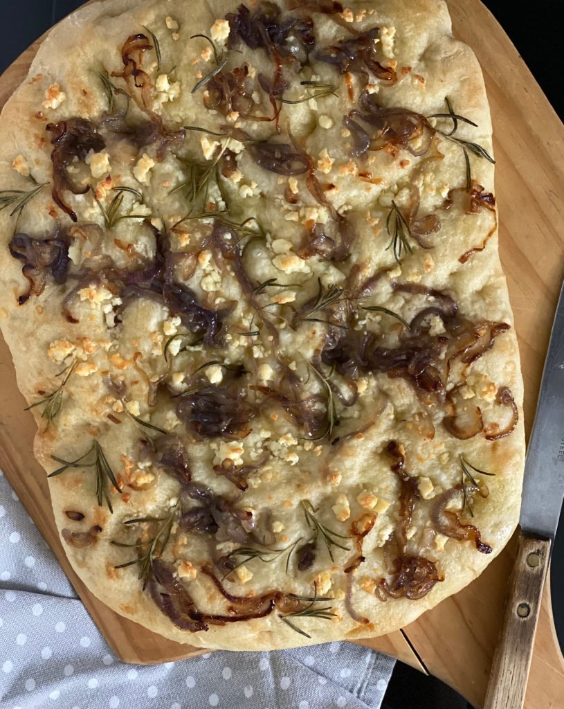 Maple Onion and Feta Focaccia on cutting board Pure Maple